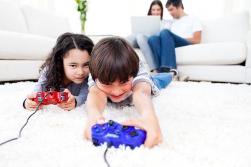 Brother and sister playing video games Brother and sister playing video games